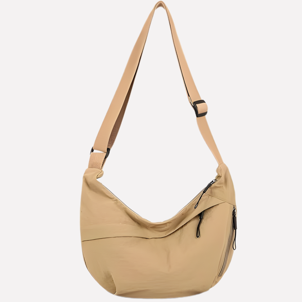 Chic ladies' crescent shoulder bag with a distinct braided detail, perfect for everyday style.