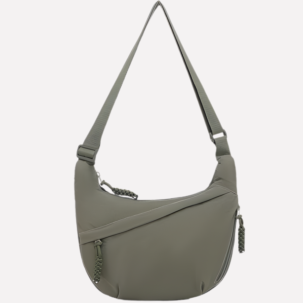 Stylish women's crescent shoulder purse. Features a unique braided detail. An ideal everyday bag.