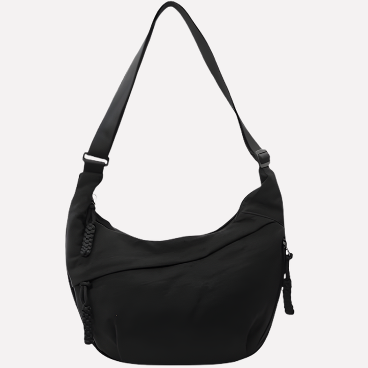 Ladies' fashion crescent handbag with a unique braided accent. Great for daily use.