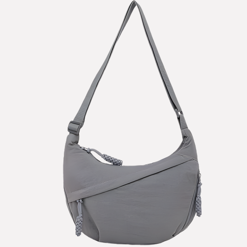 Versatile women's crescent purse with braided detail, perfect as an everyday shoulder bag.