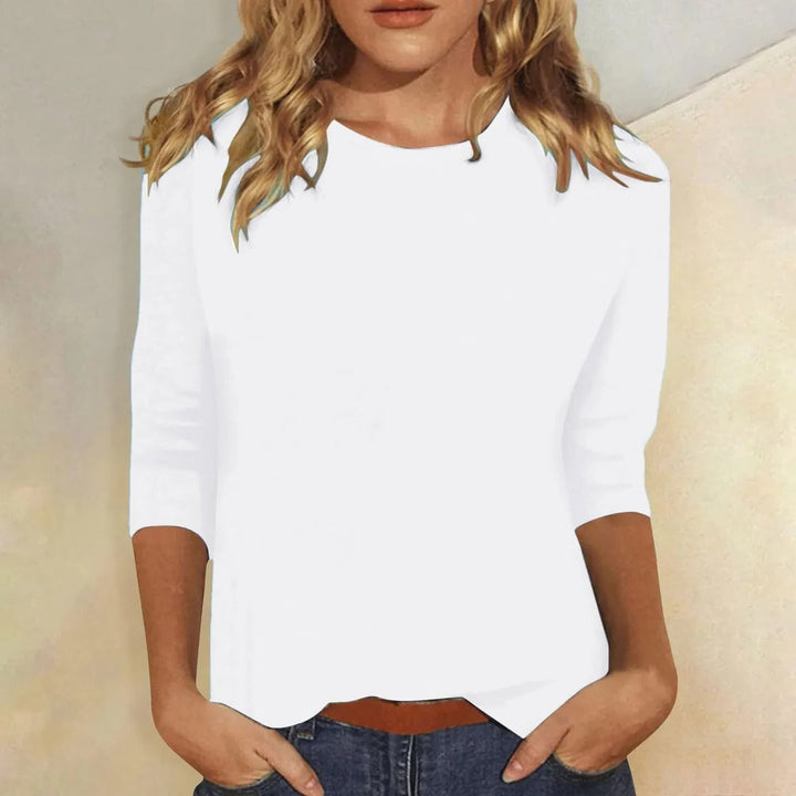 Versatile women's crew neck 3/4 sleeve top, relaxed fit for everyday, office, or weekend style.