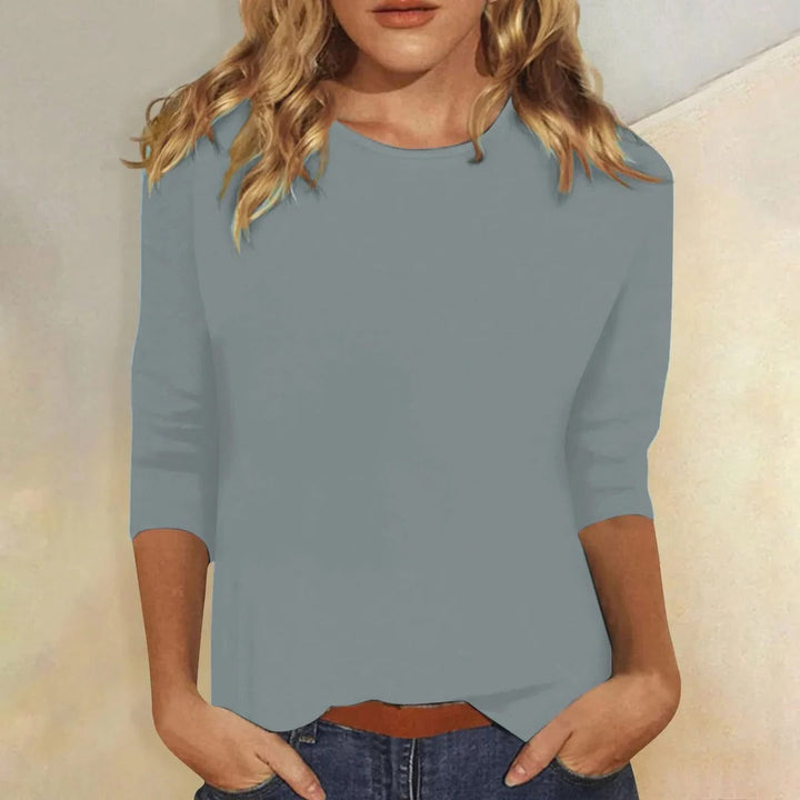 Relaxed fit women's crew neck 3/4 sleeve top, ideal for comfortable casual and everyday wear.