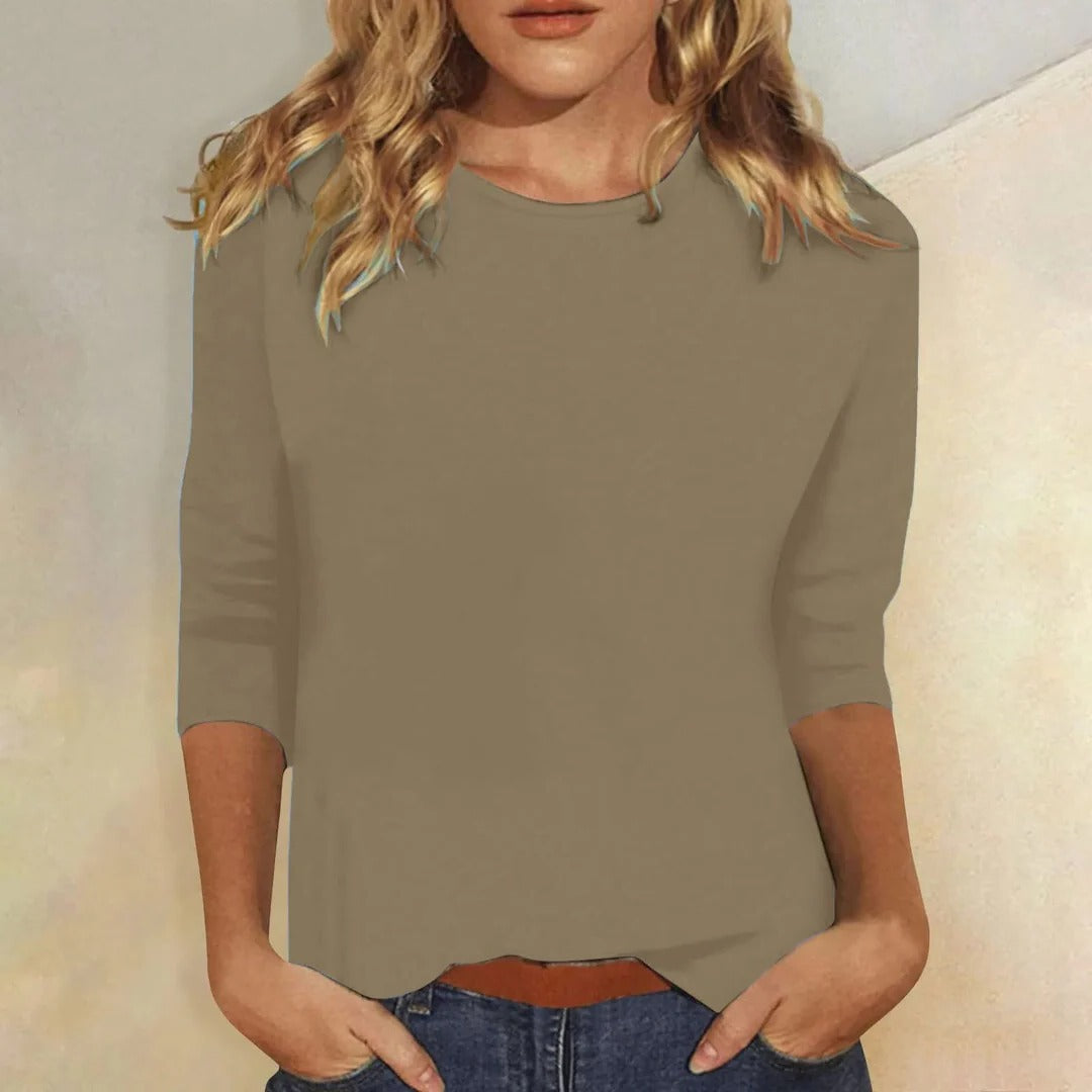 Casual women's crew neck 3/4 sleeve top, relaxed fit, an essential for comfortable everyday style.