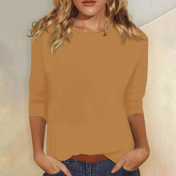 Everyday women's relaxed fit 3/4 sleeve crew neck top, excellent for casual, office, or weekend wear.