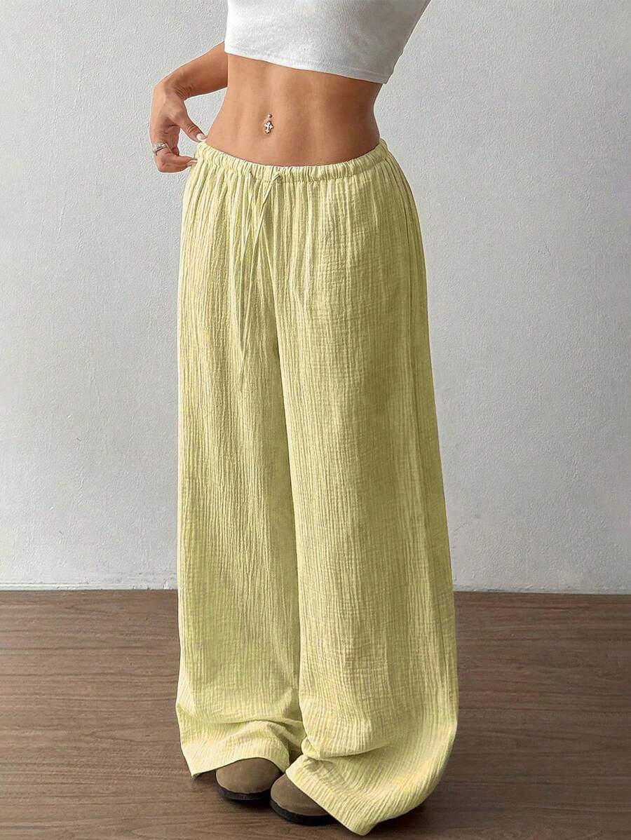 Stylish women's crinkle wide leg pants, flowy & comfortable with an adjustable drawstring waist.