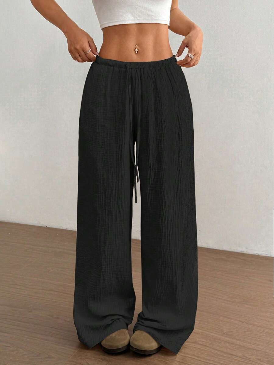 Light & airy women's crinkled wide leg summer pants with a comfortable drawstring elastic waist.