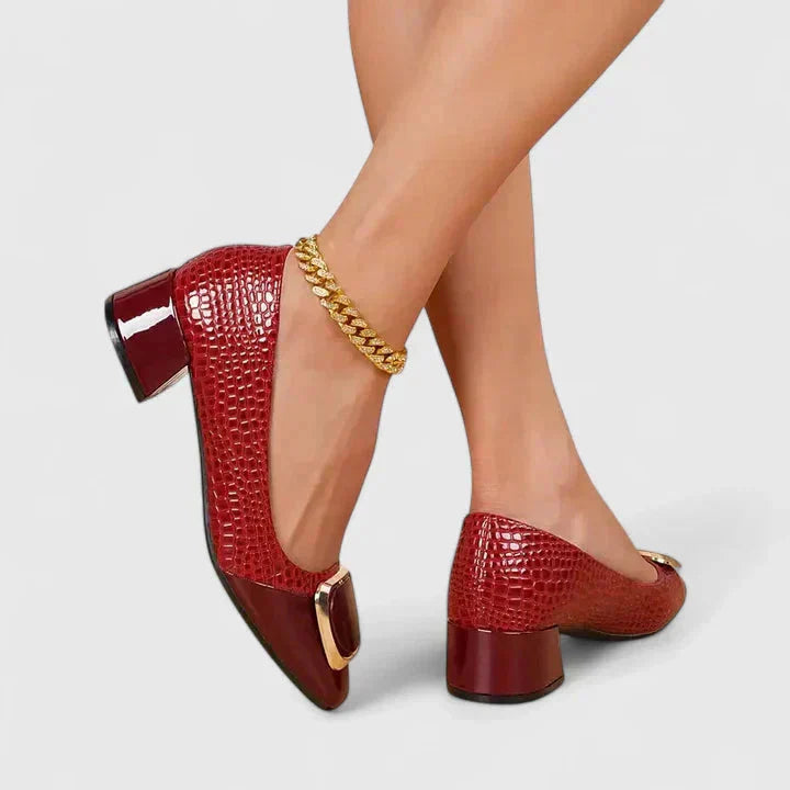 Comfortable women's croc embossed block heel loafers with gold buckle, versatile for office or dress shoes.
