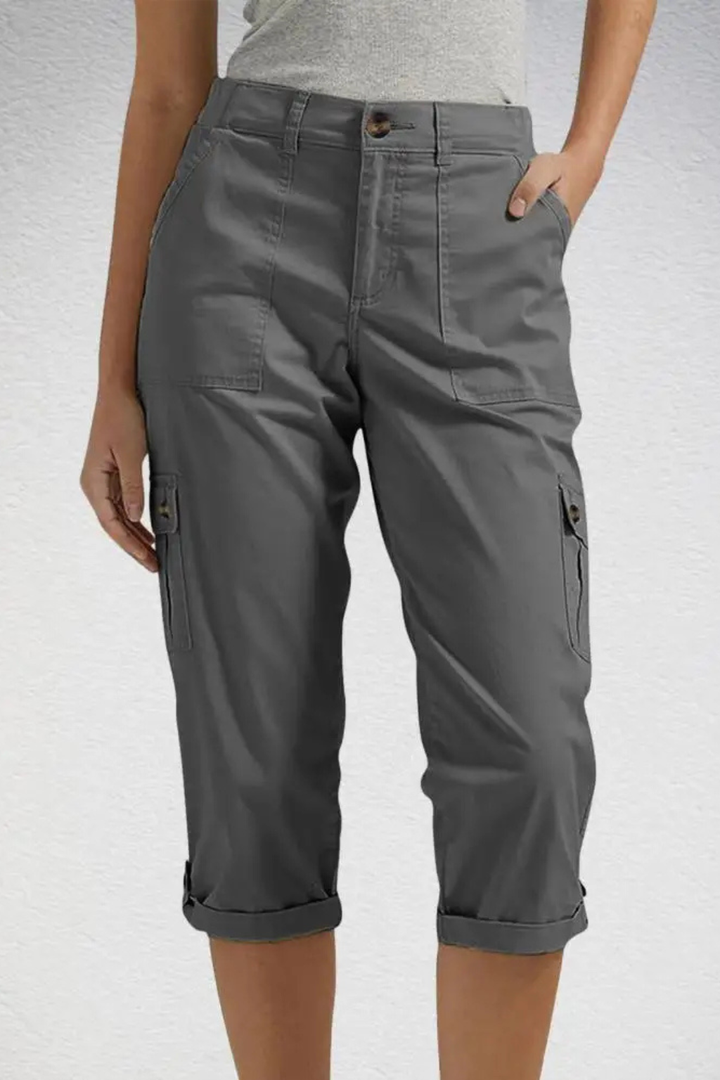 Back view of women's relaxed fit cropped cargo pants, showing rear pockets. Perfect utility capris.