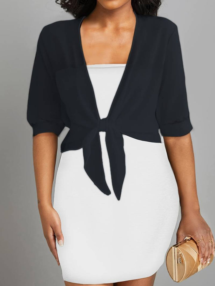 Versatile women's sheer tie-front bolero; cropped, half-sleeve top for elegant layering.