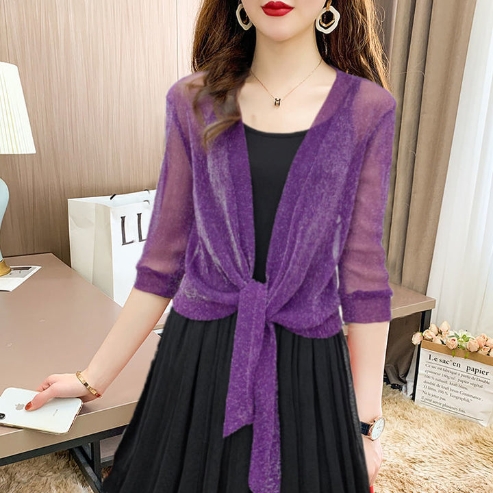 Fashionable women's sheer bolero top, cropped with tie-front detail; perfect layering accessory.