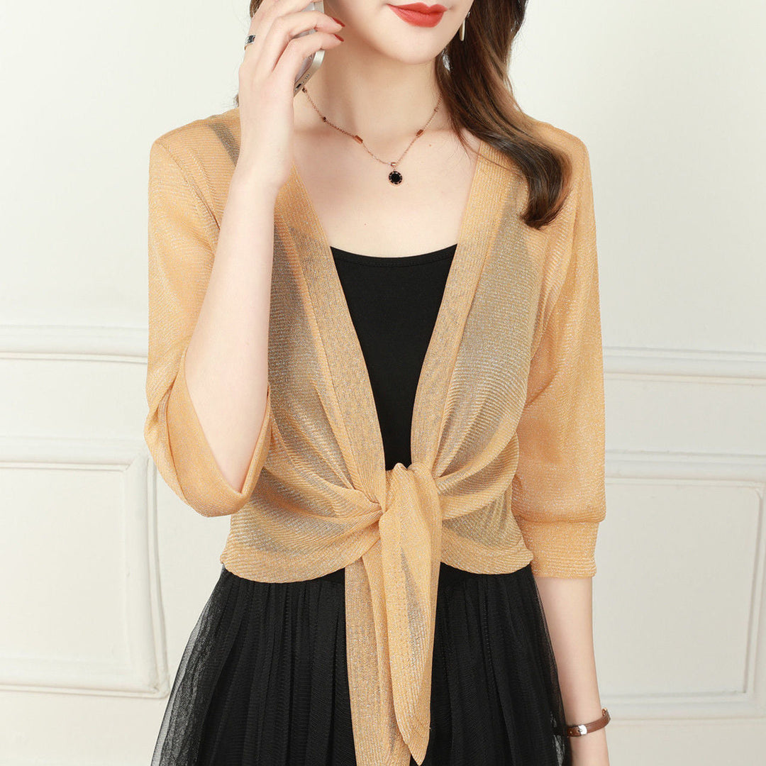 Women's sheer cropped tie-front bolero top, elegant half-sleeve layering piece.