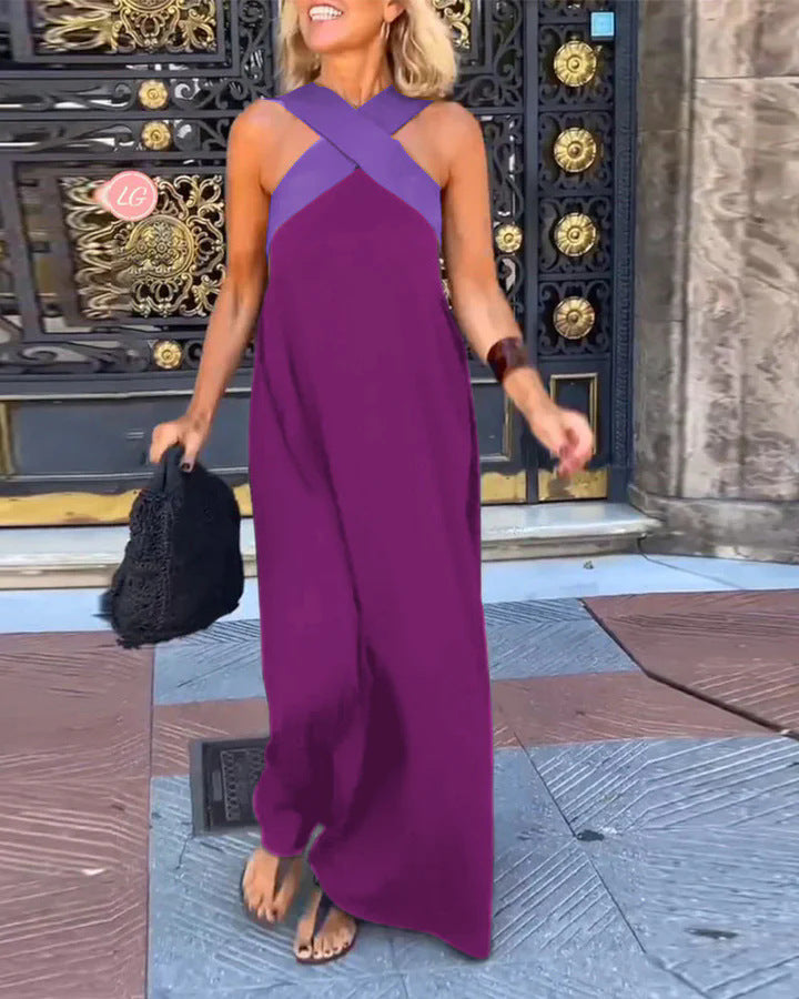 Flattering women's long flowy maxi dress with a stylish cross neck. Perfect for casual evening comfort.