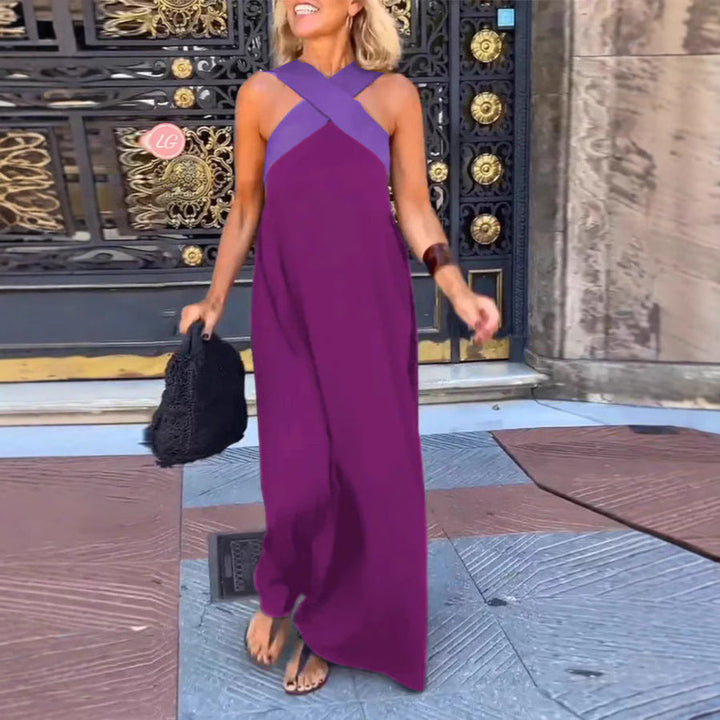 Elegant women's flowy maxi dress featuring a chic cross neck design, comfortable & flattering fit.