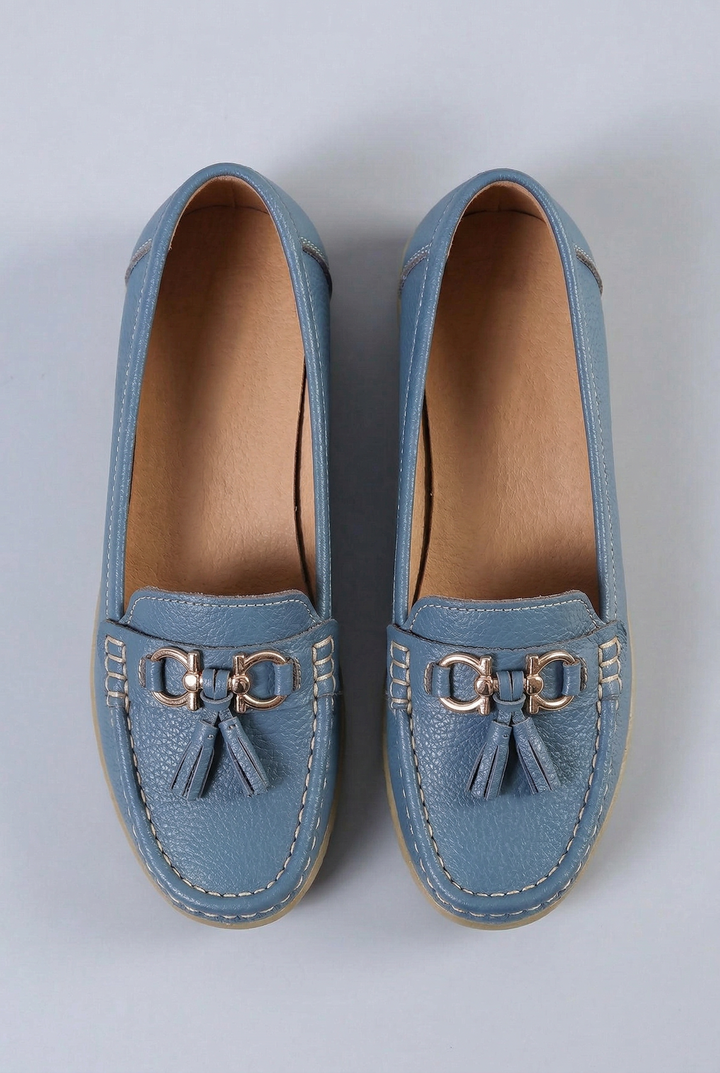 Top view: Stylish women's casual loafers with cushioned sole. Easy slip-on everyday footwear.