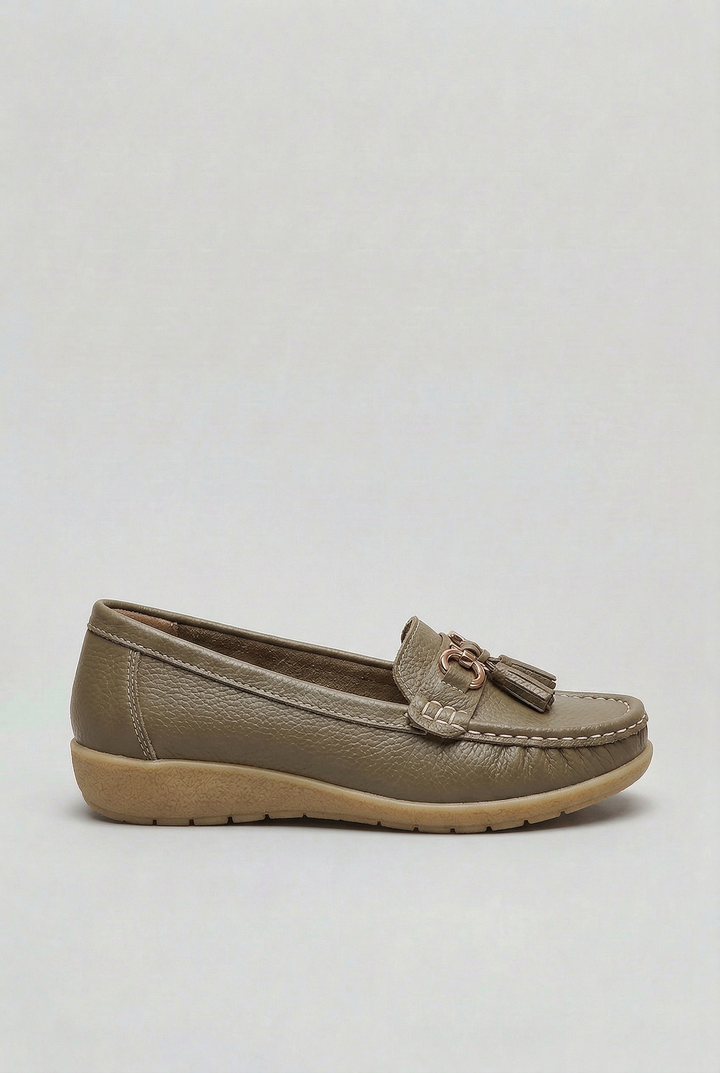 Durable rubber sole on women's cushioned loafers. Flat slip-on design ensures grip & all-day comfort.