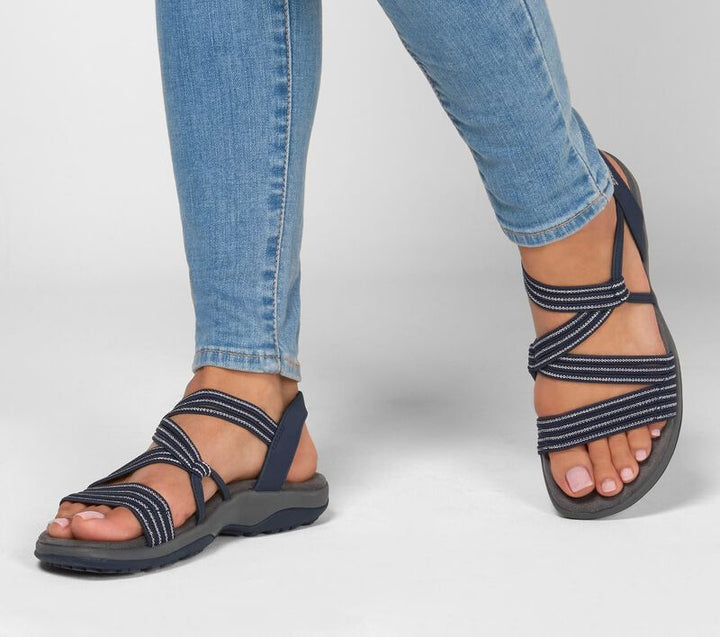 Comfortable women's slip-on sandals, ideal for summer. Features soft cushioning for all-day easy wear.
