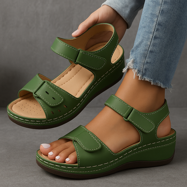 Women's cushioned wedge sandals with adjustable strap for comfortable casual summer walking.