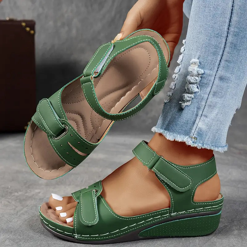 Stylish ladies' wedge sandals, hook and loop adjustable strap, ergonomic comfort for everyday wear.