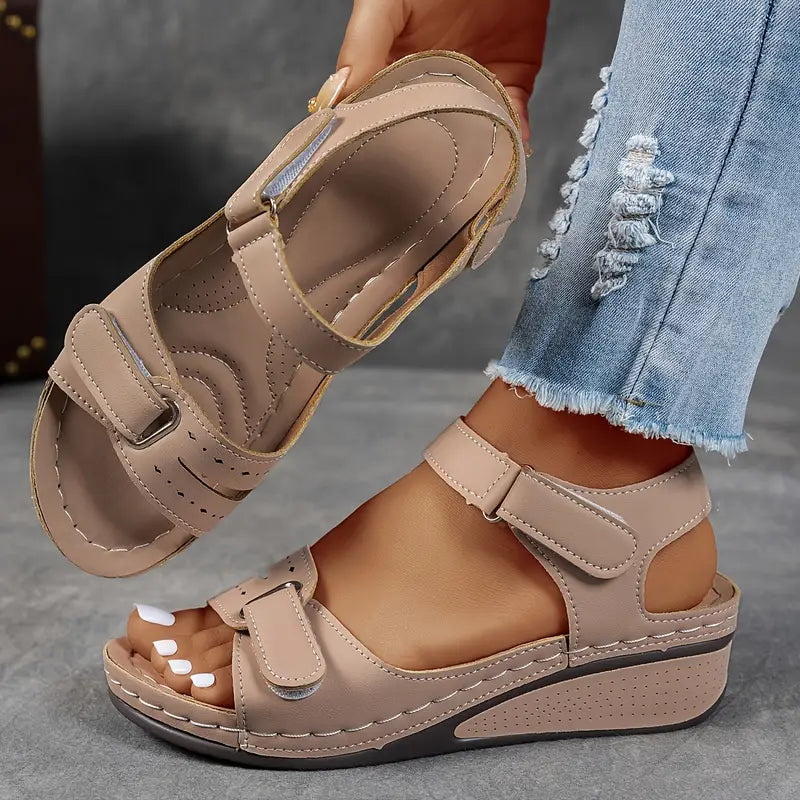 Comfortable women's walking sandals, wedge heel, adjustable straps, great for everyday casual summer adventures.