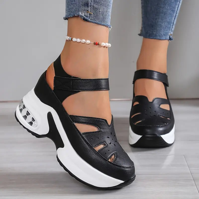 Mary Jane style women's wedge sandals with breathable cutouts, closed toe, and comfort cushioning.