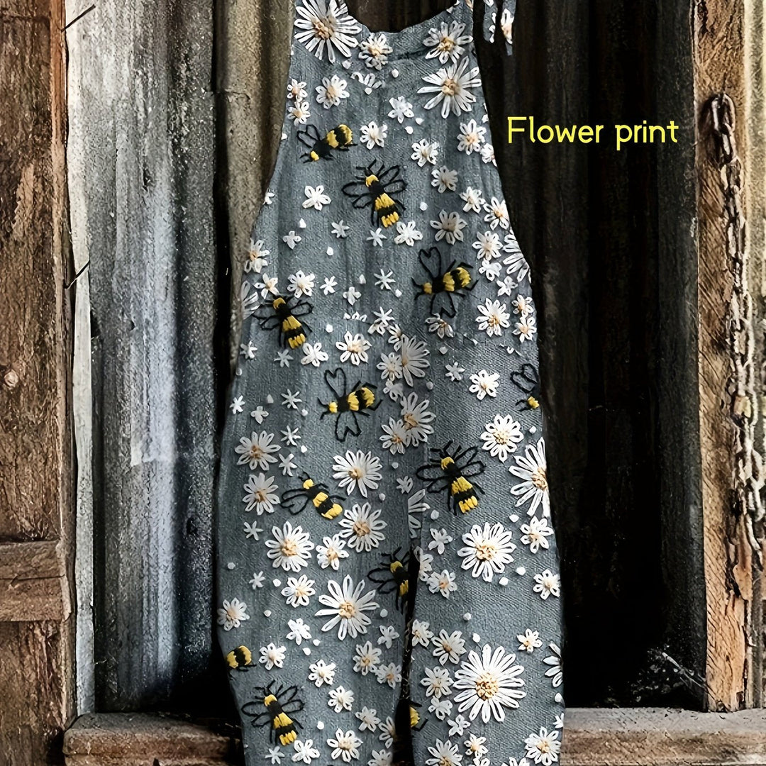 Woman enjoying summer in a relaxed fit daisy bee print tie-shoulder casual wide-leg jumpsuit.