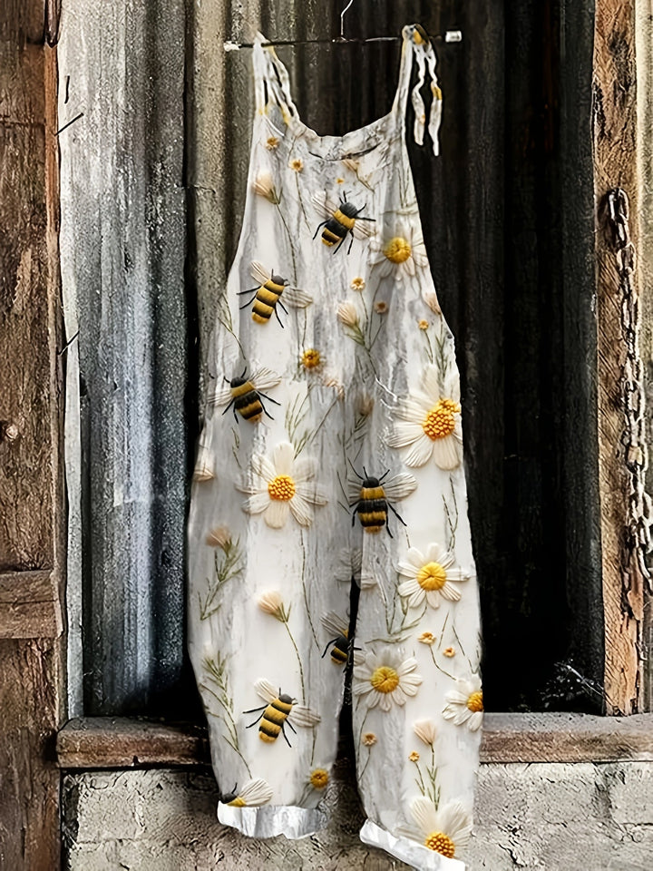 Bohemian wide-leg casual jumpsuit for women, featuring a cute daisy bee print and tie shoulders.