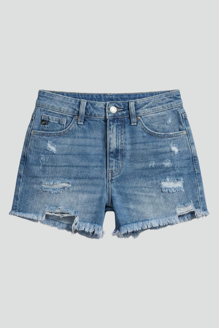 Women's dark blue distressed mid-rise denim shorts with stylish frayed edges, perfect for casual summer fashion.