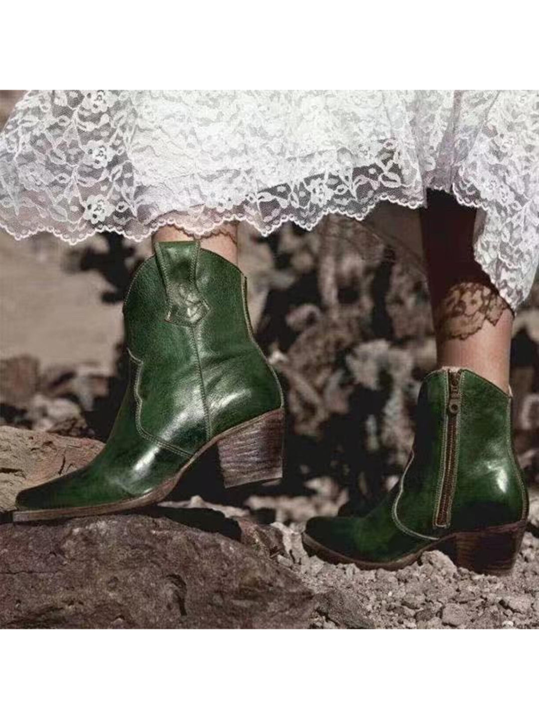 Chic women's dark green ankle cowgirl boots, featuring a distinct snip toe, practical side zip, and western charm.