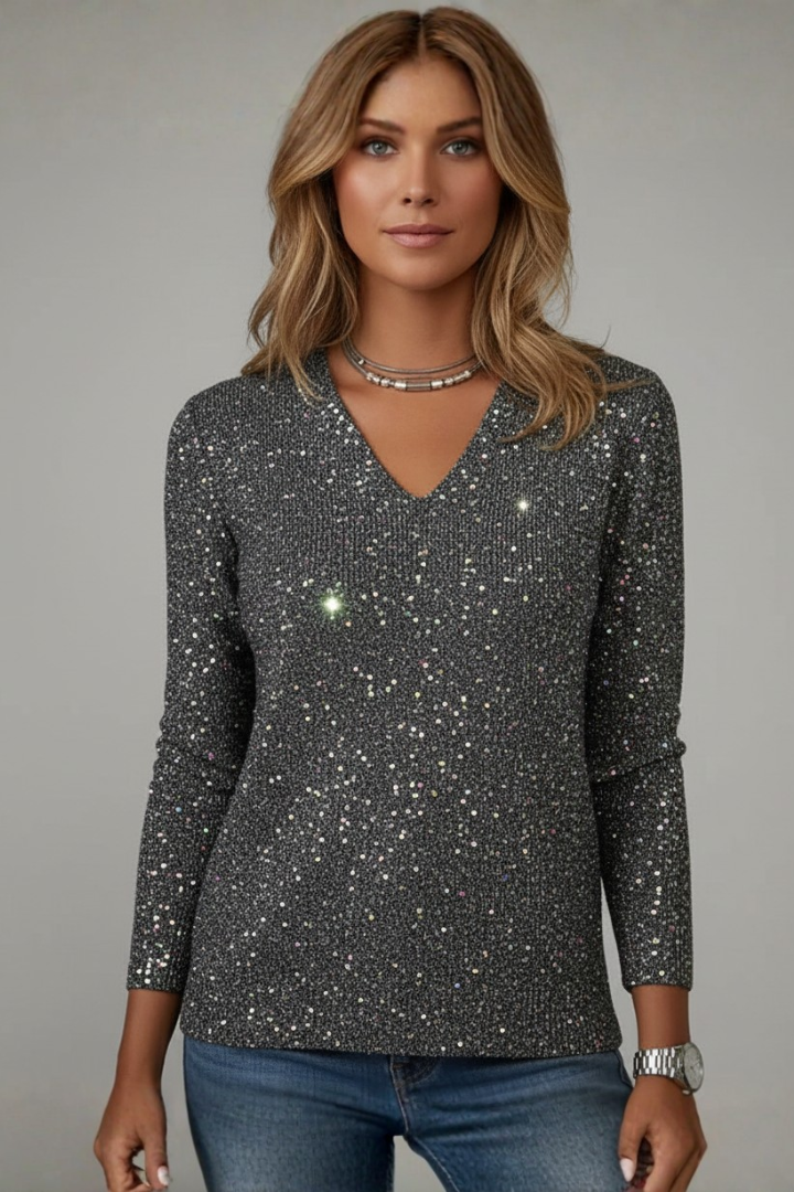 Women's long-sleeve V-neck sweater with all-over dazzling sequins. Perfect glamorous sparkle top for parties.
