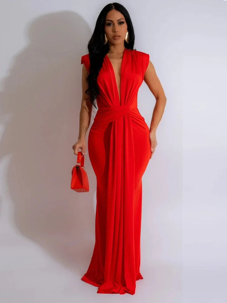 Women's deep V-neck draped bodycon maxi dress. Elegant sleeveless long gown with side slit for evening & formal events.