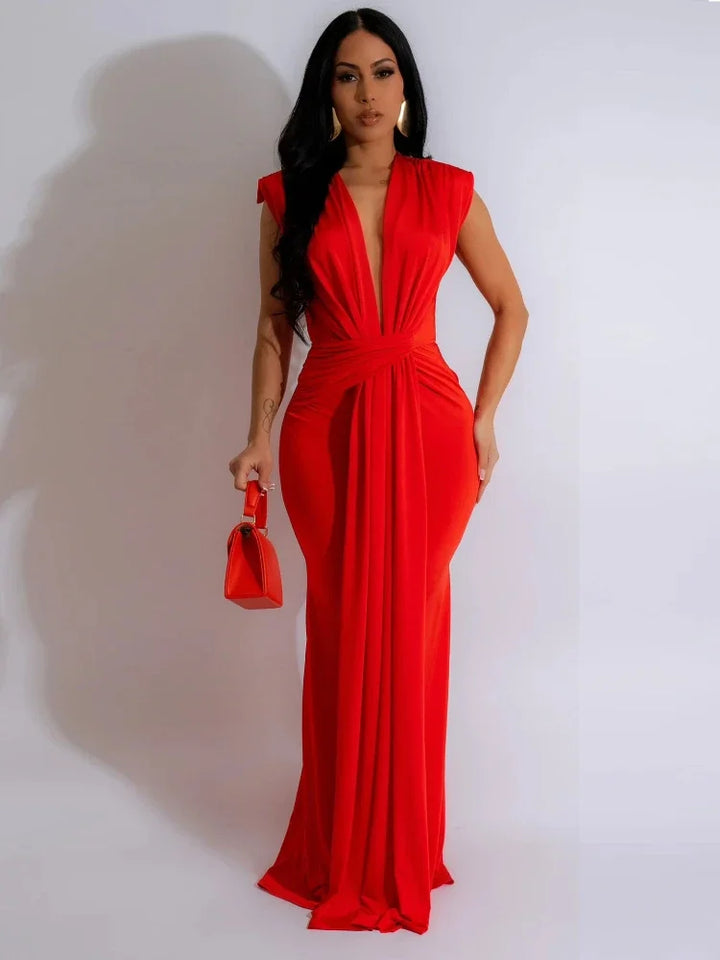 Women's deep V-neck draped bodycon maxi dress. Elegant sleeveless long gown with side slit for evening & formal events.