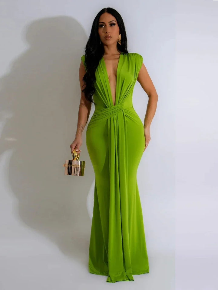 Sleeveless long maxi dress for women, featuring a deep V-neck, draped bodycon design. Ideal for elegant formal events.