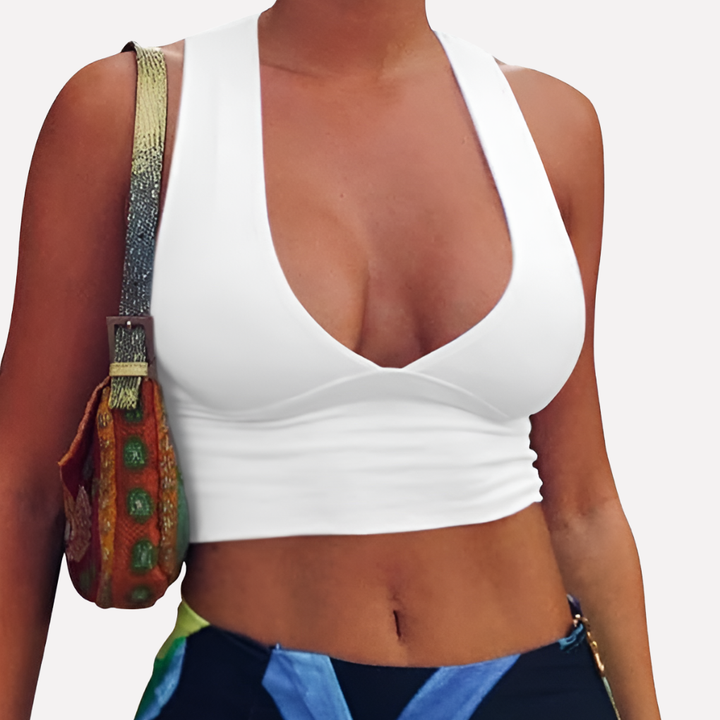 Trendy women's summer crop top: deep V-neck, racerback, and elegant front cutout. Ideal for a casual, stylish look.