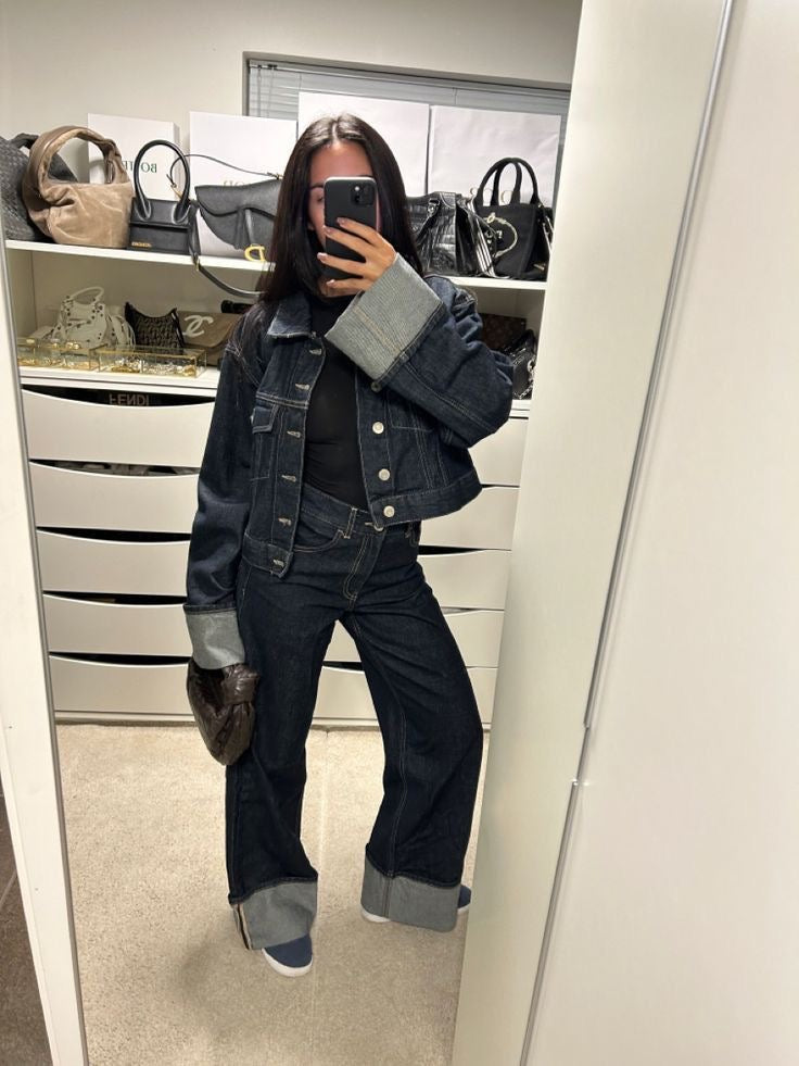 Side profile of a woman wearing a stylish denim cropped jacket and pants set for spring
