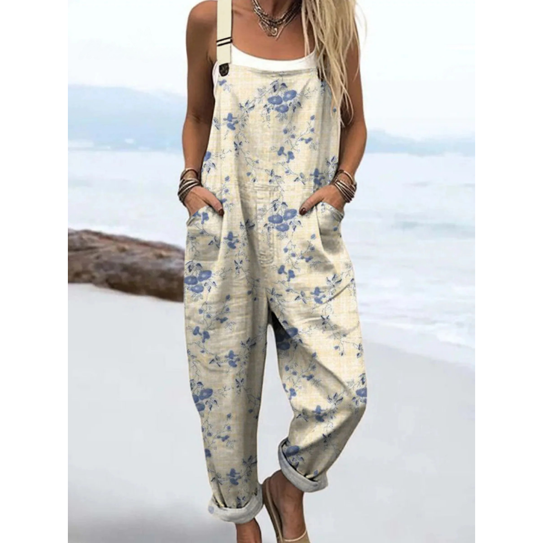 Women's Ditsy Floral Pocket Boho Jumpsuit. Stylish floral print one-piece for comfortable summer fashion.