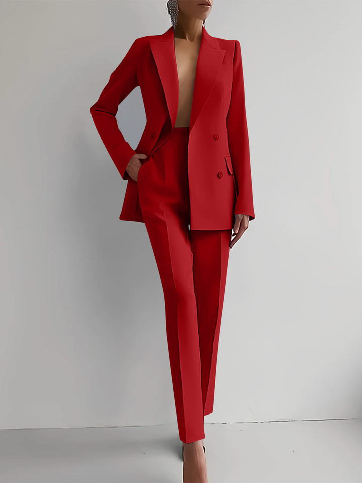 Women's double-breasted blazer & slim trousers suit set. Tailored professional office wear for women.