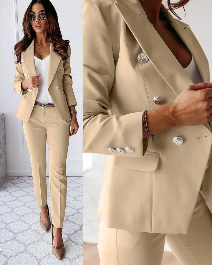 Elegant women's double-breasted blazer and matching tailored trousers for professional workwear.