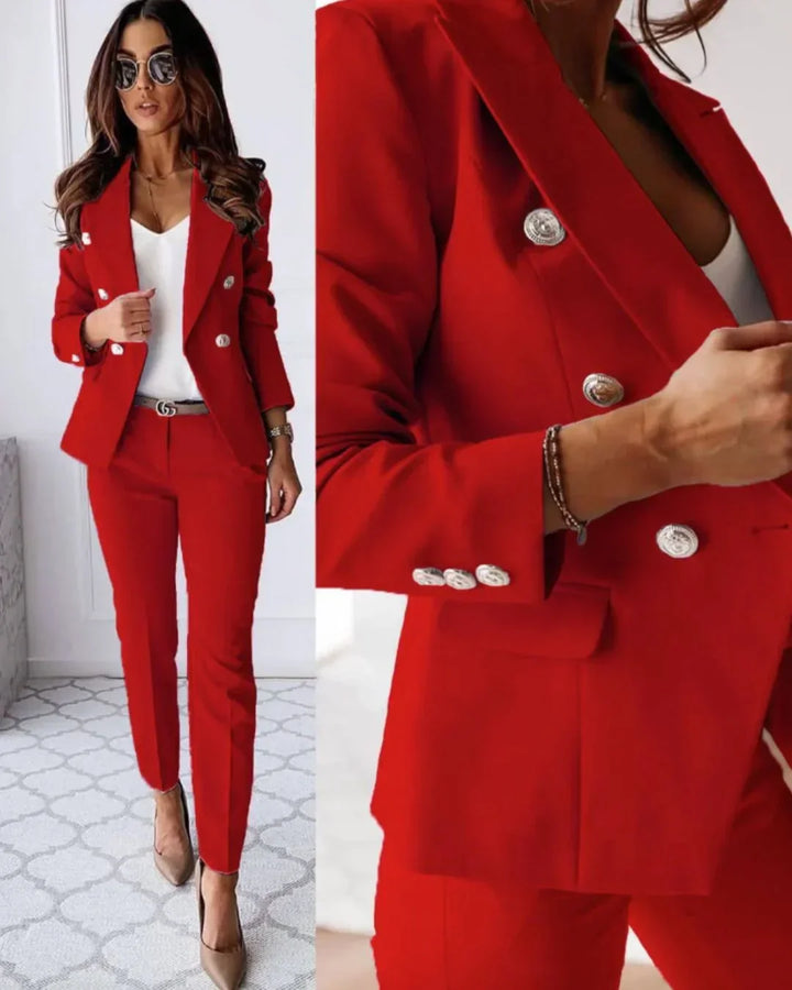 Stylish women's tailored trousers paired with a double-breasted suit jacket for business attire.