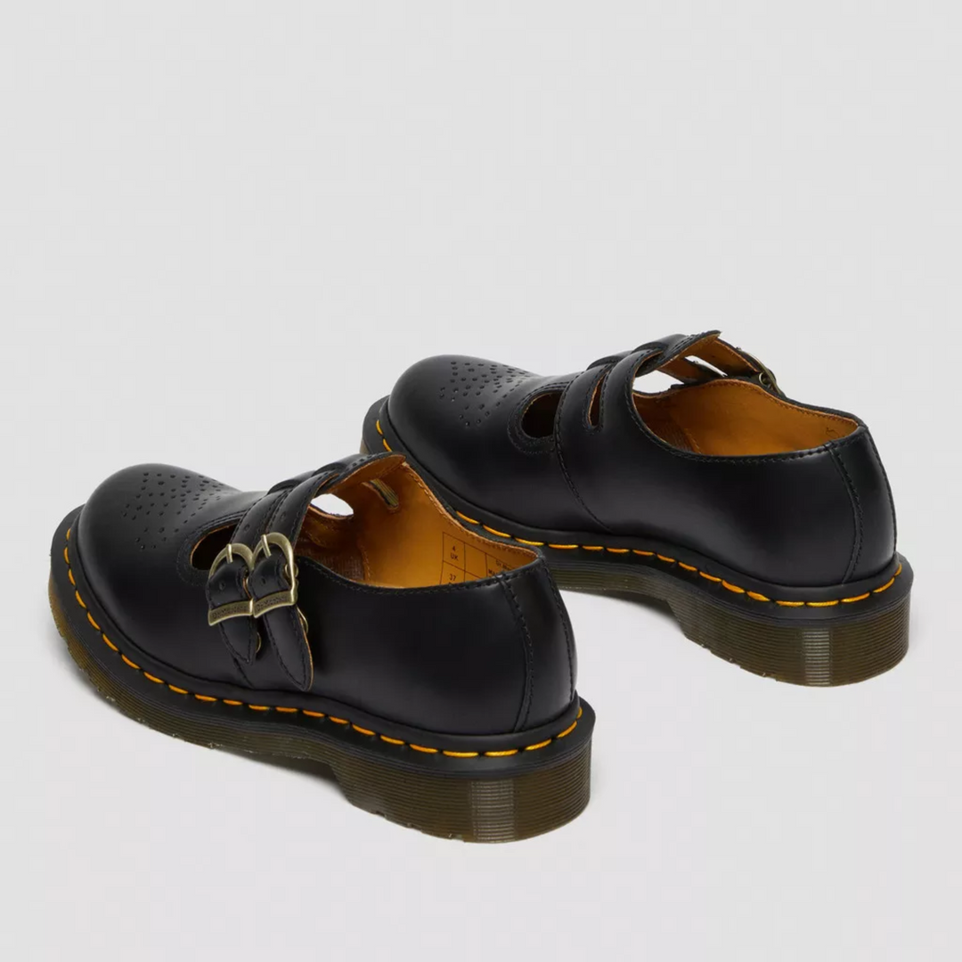 Edgy women's buckle flats, black double strap Mary Janes with round toe.