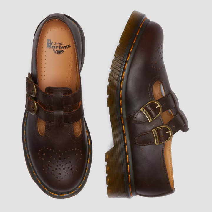 Detail of the comfortable sole on women's black double buckle Mary Janes, flat spring/summer shoe.