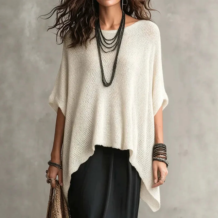 Women's draped poncho top with elegant boat neck and loose fit. Perfect for casual chic spring/fall fashion.