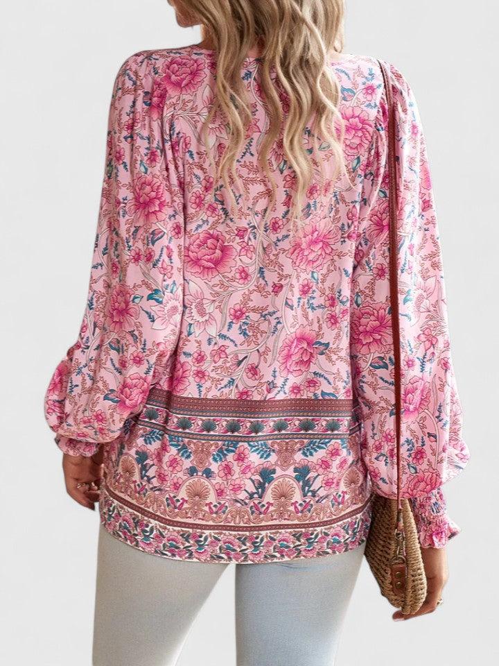 Feminine boho chic long sleeve top with dreamy floral print for versatile everyday wear.
