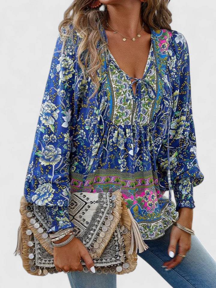 Dreamy floral long sleeve top, a women's relaxed fit boho peasant blouse for everyday style.