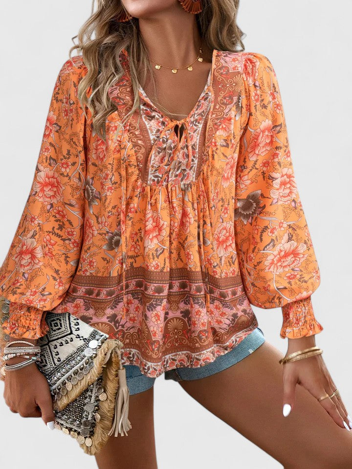 Boho chic women's floral long sleeve peasant top, a relaxed fit blouse for spring/summer fashion.