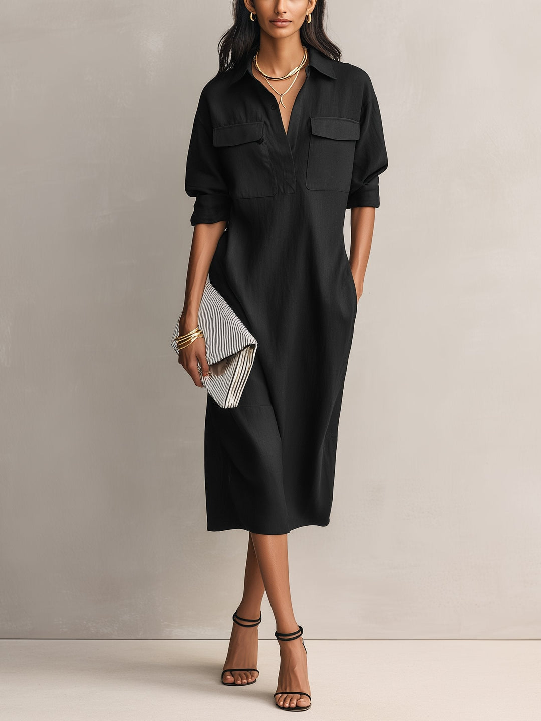 Women's effortless black collared midi shirt dress with elbow sleeves, perfect for casual everyday wear.