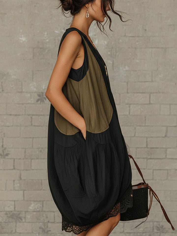 Stylish women's black sleeveless midi dress in a relaxed fit, featuring a V-neck and delicate lace hem for summer style.
