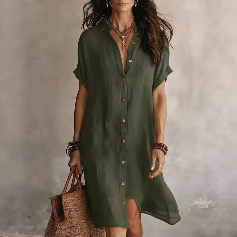 Close-up of the flowing fabric and button-front detail on this elegant women's midi dress, ideal for brunch.