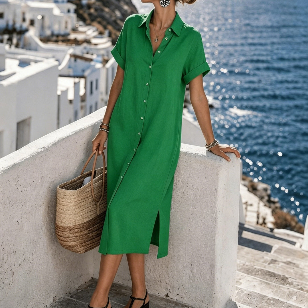 Comfortable women's short sleeve button-front midi shirt dress, vacation ready.