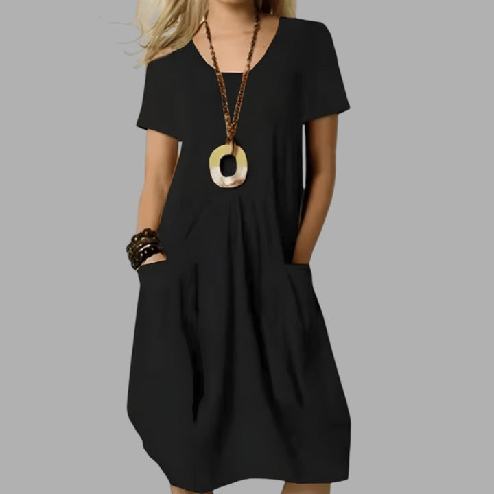 Stylish women's midi dress, perfect for effortless daily wear. A comfortable spring & summer casual fashion piece.