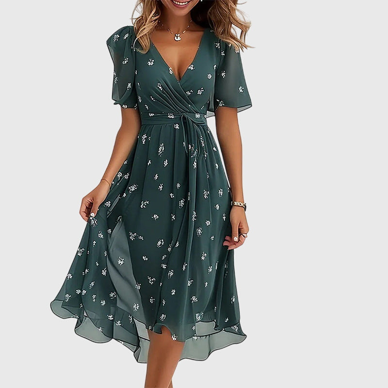 Women's summer midi dress with elegant flutter sleeves. Chic, comfortable, and perfect for special occasions.